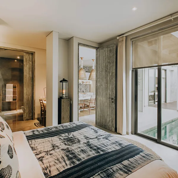 Bedroom opening onto the lap pool
