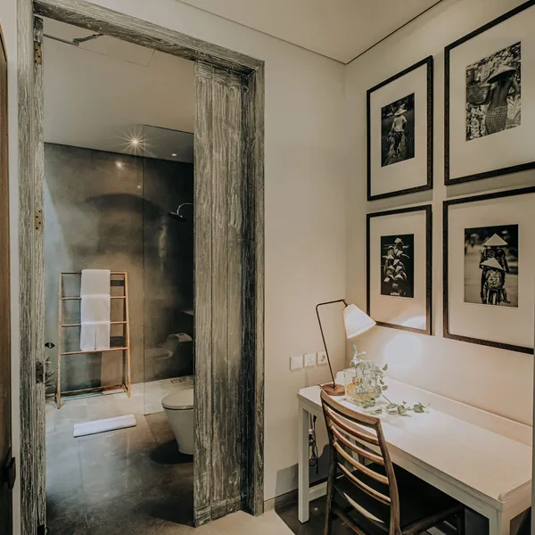 Desk corner with framed photographs