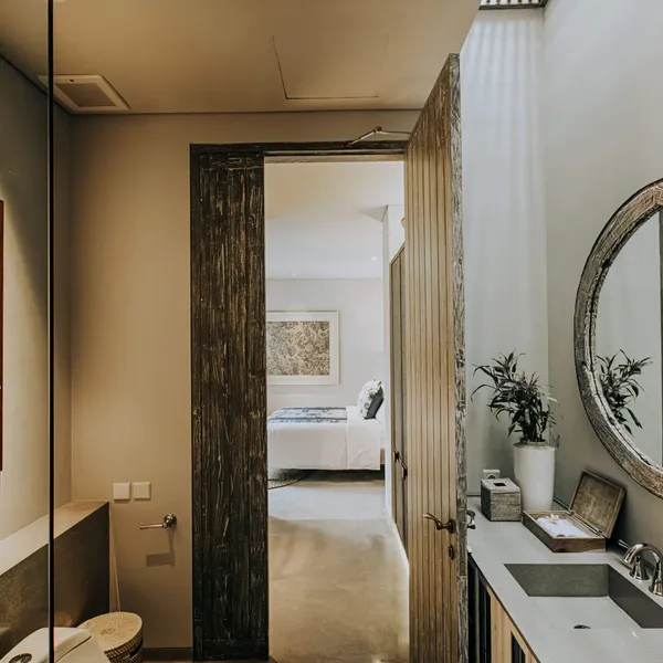 Bathroom vanity with a round mirror